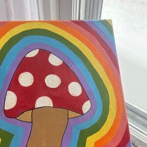 red and white mushroom with rainbow color background🍄